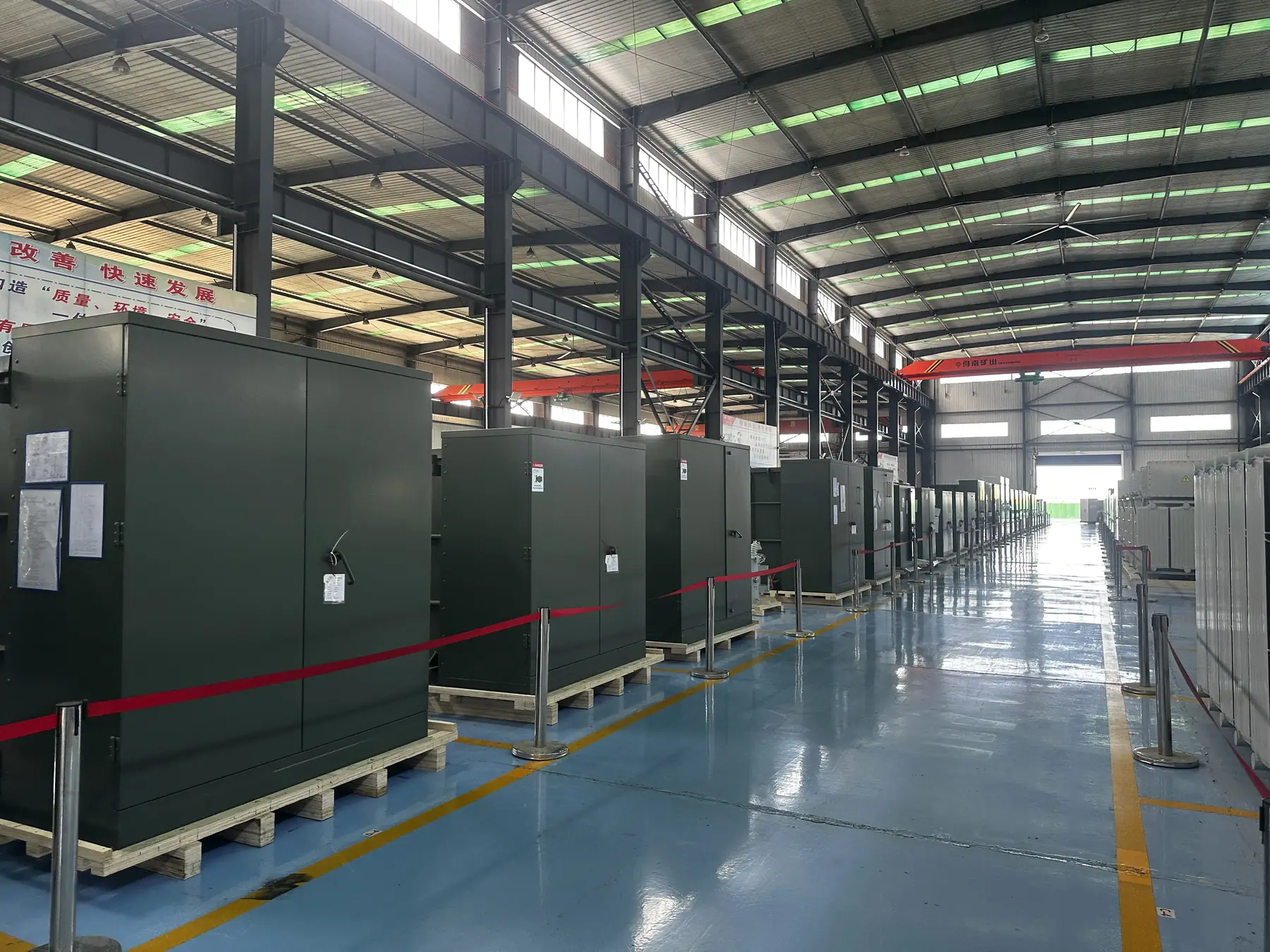 Pad-mounted transformer factory production line with units prepared for export shipment