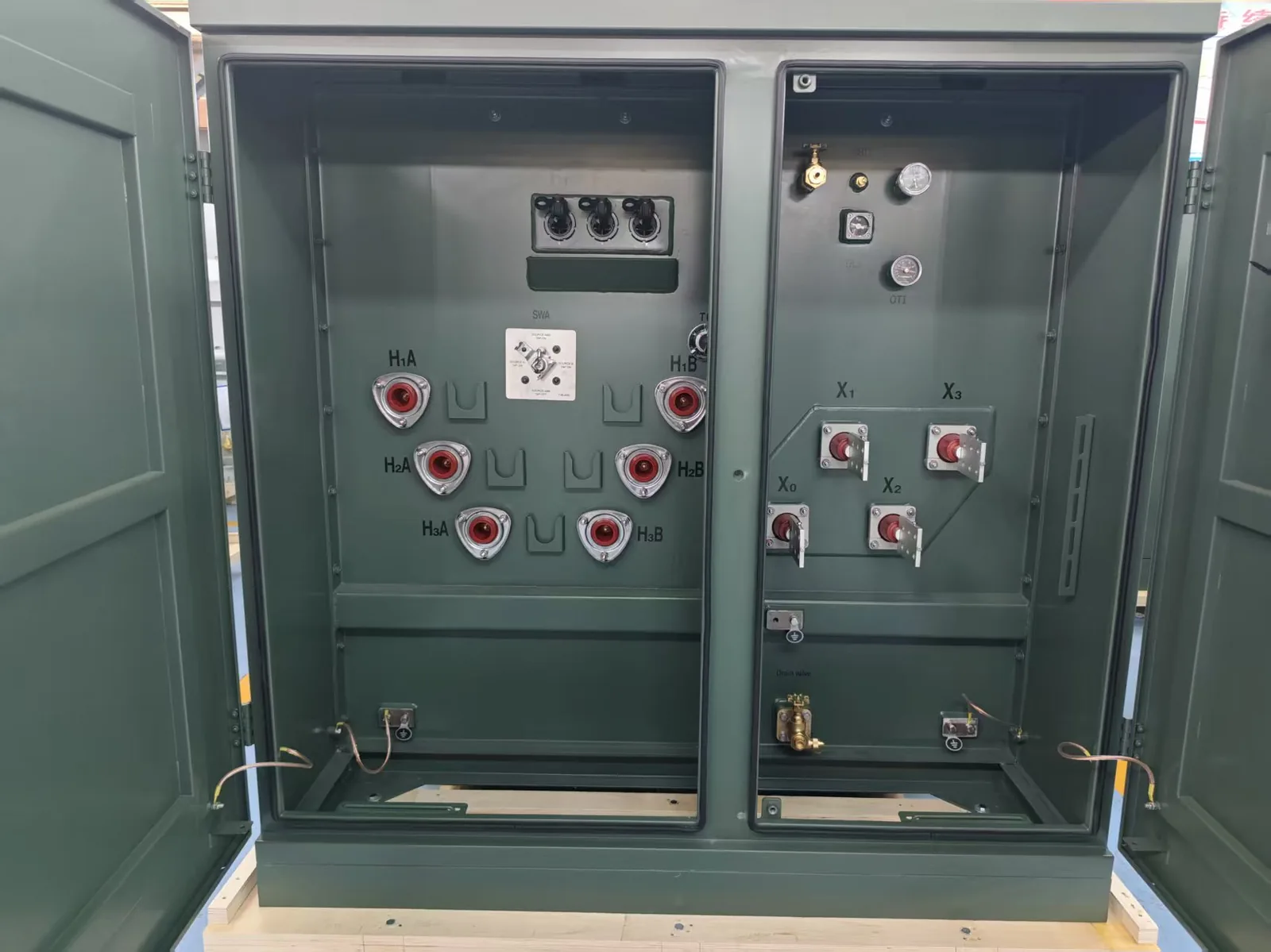 Open primary and secondary compartments of a pad-mounted transformer for RFQ interface review